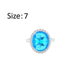 Asfour Crystal Drew Ring With Halo Aquamarine Oval Design In 925 Sterling Silver-RD0214-M-7