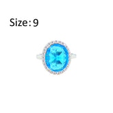 Asfour Crystal Drew Ring With Halo Aquamarine Oval Design In 925 Sterling Silver-RD0214-M-9